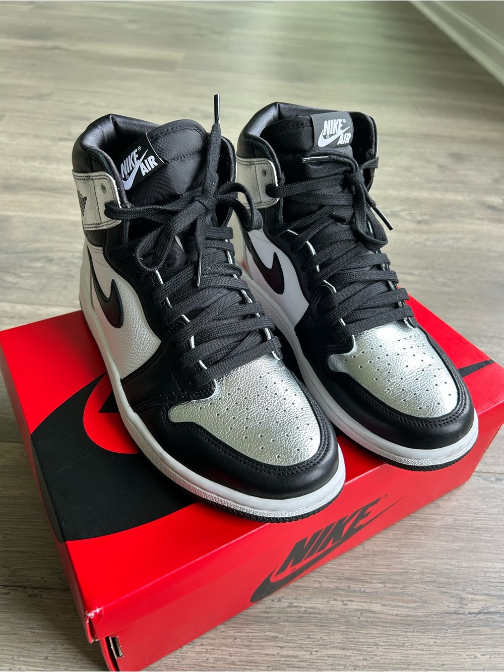 Nike Air Jordan 1 women’s silver toes black silver and white size 9